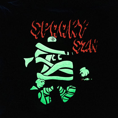 Adult model wearing blue graphic tee with "Spooky SZN Waffle" design