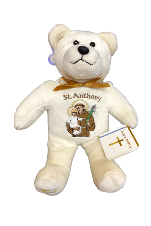 White teddy bear with embroidered image of St. Anthony.